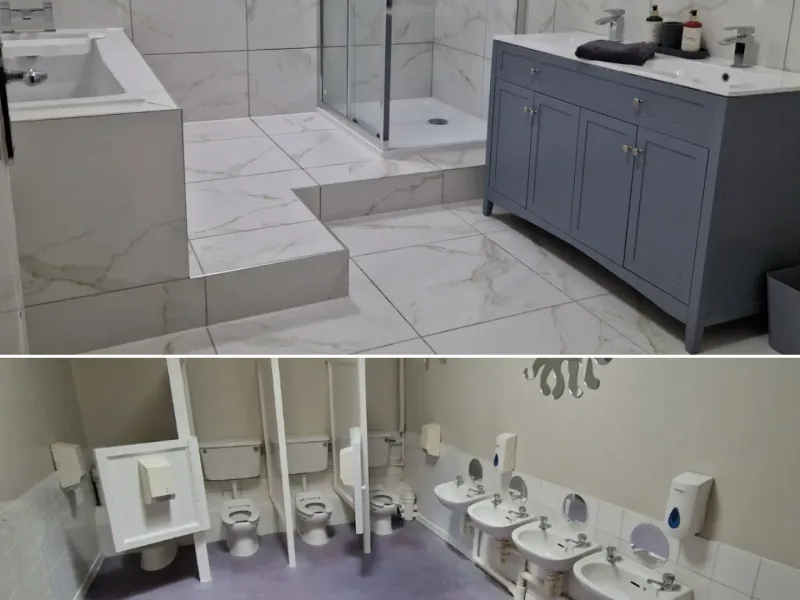 Full marble bathroom renovation with glass shower enclosure and double vanity