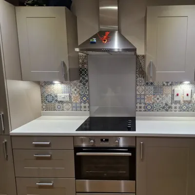 Decorative patterned tile kitchen backsplash with mixed designs